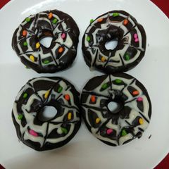 A picture of Eggles chocolate doughnut.