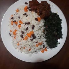 A picture of White Rice with Veggies.