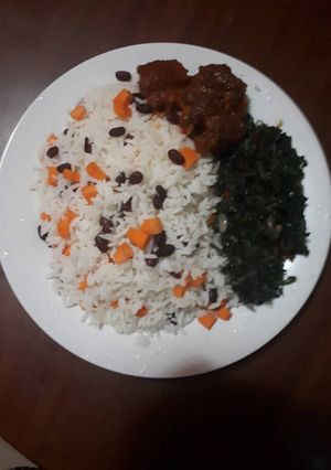 A picture of White Rice with Veggies.