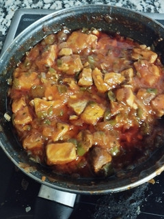 Una foto de Carne con tomate