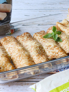 Una foto de Crepes rellenos de verduras asadas y merluza