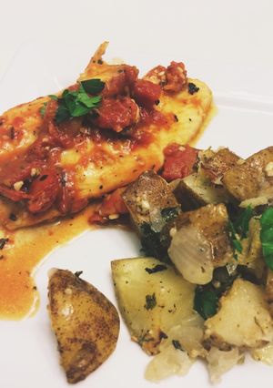 A picture of Roasted Tomato & Garlic Tilapia Fillets.