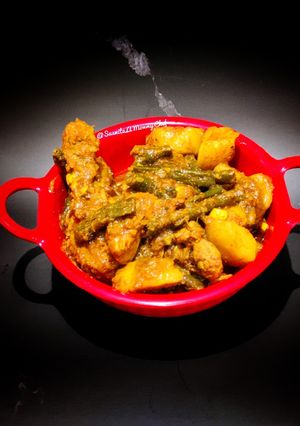 A picture of Chicken curry with vegetables.