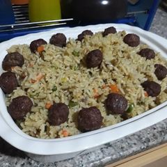 A picture of Fried rice with meat balls.