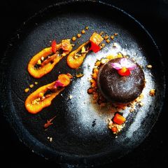 Deconstructed gajar halva representing carrot lava cake with carrot caramel sauce: A picture of Deconstructed gajar halva representing carrot lava cake with carrot caramel sauce:.