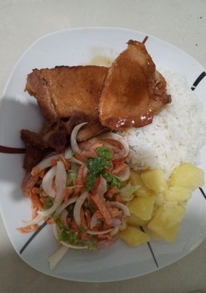 Una foto de Chuleta ahumada en salsa de naranja