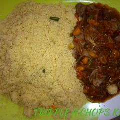 A picture of Couscous With liver sauce.