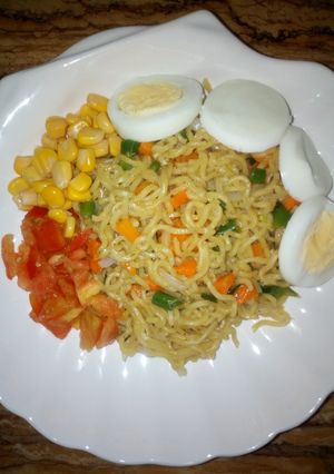 A picture of Butter Noodles and Egg With Veggies.