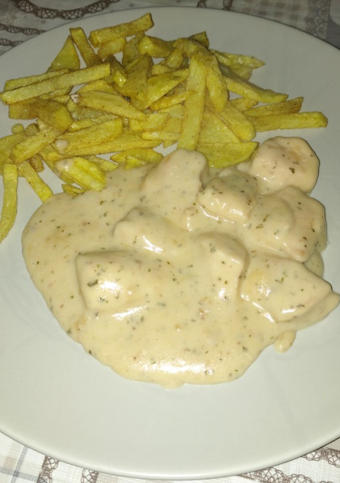 Una foto de Pollo con salsa bechamel