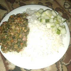 A picture of Rice with leaf stew.