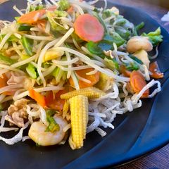 A picture of Stirfry with Fried Noodles.
