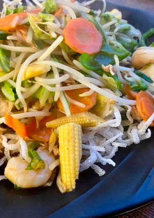 A picture of Stirfry with Fried Noodles.