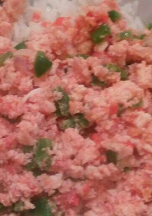 A picture of Scrambled eggs with white Rice.