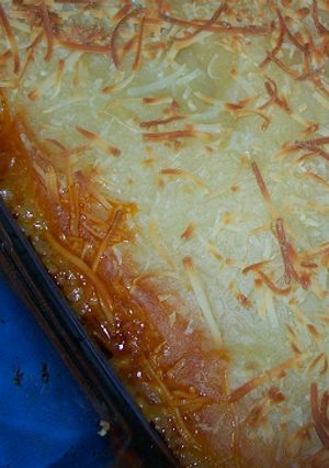 Una foto de Canelones con langostinos y setas