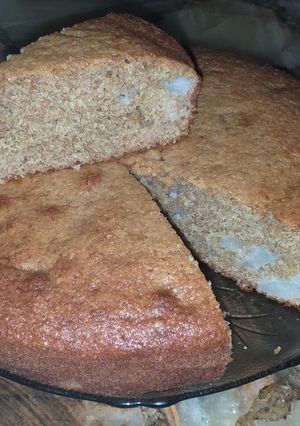 Una foto de Torta integral de mandarina y pera