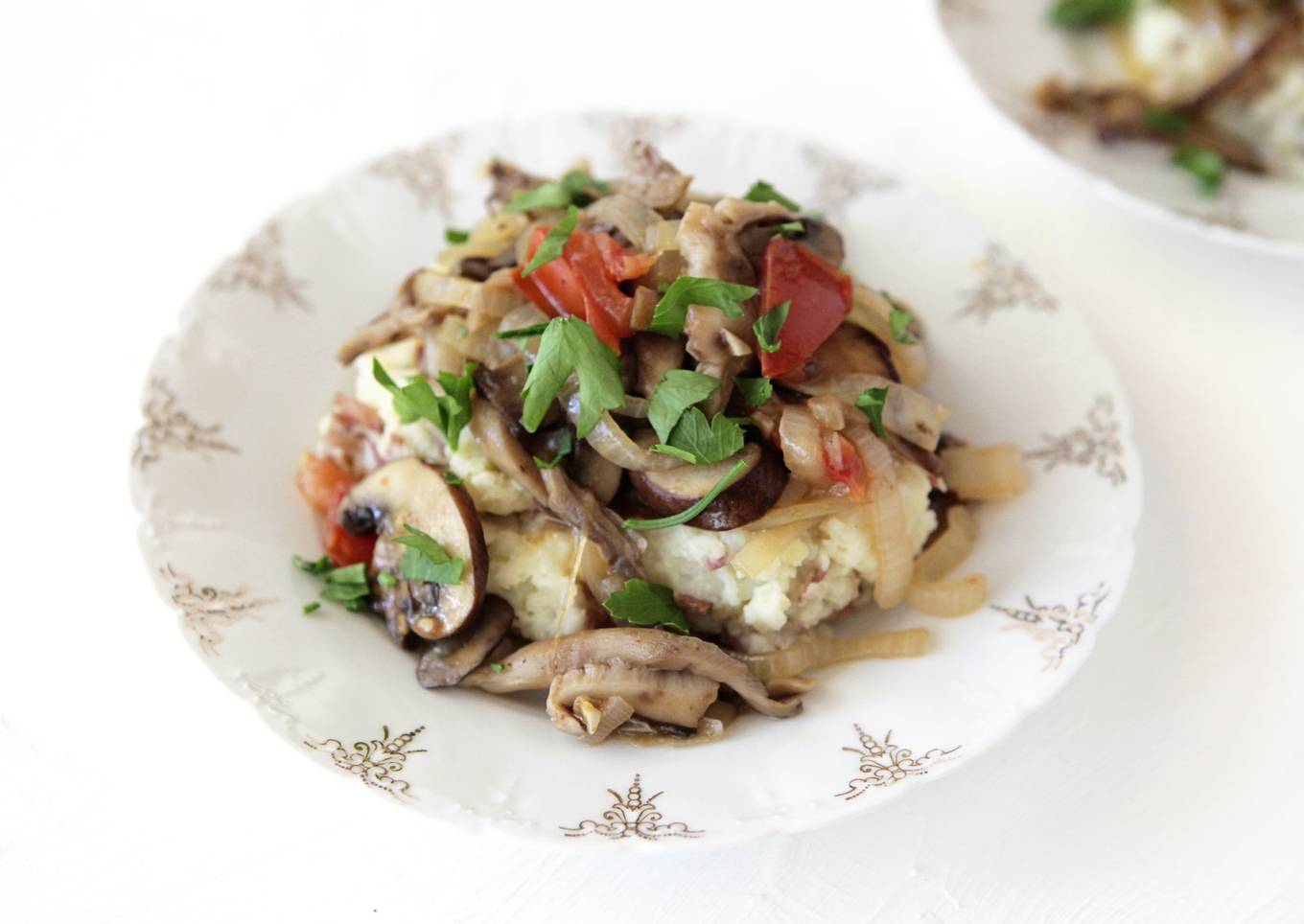 Mixed mushroom fricassee on peeled potatoes with rosemary