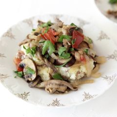 A picture of Fricassee of Mixed Mushrooms over Smashed Rosemary Potatoes.