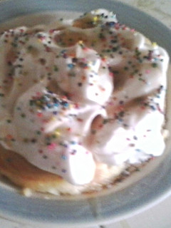 A picture of Pancake top with meringue and sprinkles.