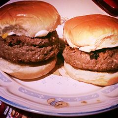 A picture of Swiss and Mozzarella Stuffed Steak Burger.
