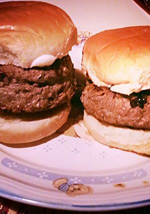 A picture of Swiss and Mozzarella Stuffed Steak Burger.
