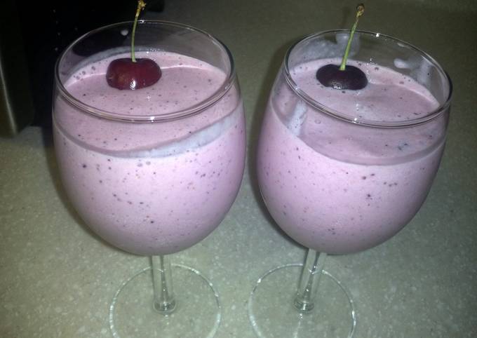 Steps to Make Any-night-of-the-week strawberry, banana ,blue Berry and mengo smoothie