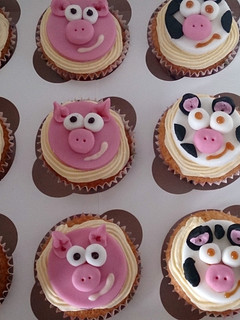 A picture of children's farm animal cupcakes.