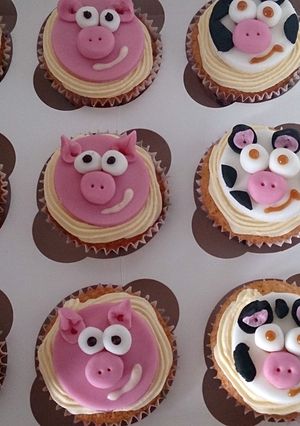 A picture of children's farm animal cupcakes.