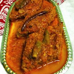 A picture of Raw banana cutlet curry.