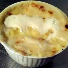 A picture of Chopper's Bourbon Poached Peach and Mascarpone Ice Cream Brulee.