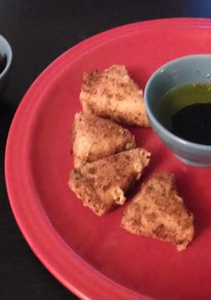 A picture of Fried brie wedges.