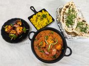 A picture of corn methi curry