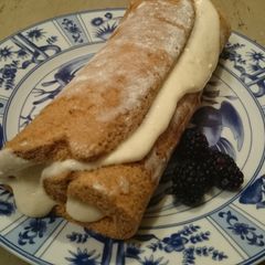 A picture of Sweet Potato Roll with Cinnamon-Apple cream cheese filling.