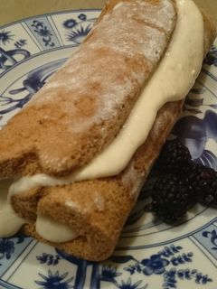 A picture of Sweet Potato Roll with Cinnamon-Apple cream cheese filling.