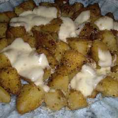 Una foto de Papas gratinadas