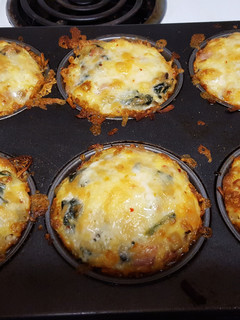 A picture of Cheesy hash brown egg nests.