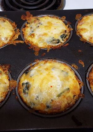 A picture of Cheesy hash brown egg nests.