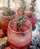 Cocktail de ginebra, bitter kas y romero