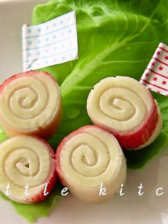 A picture of A Cute Bento Item: Crabstick and Cheese Rolls.