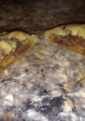 A picture of brown butter sea salt chocolate chip cookies stuffed with nutella and dulce de leche.