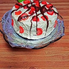 A picture of Chocolate Cake with Strawberries.