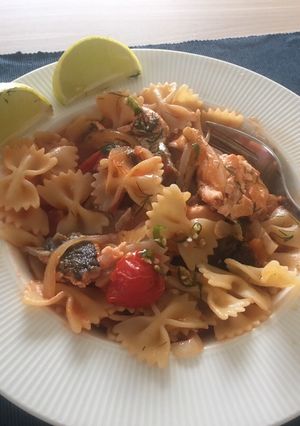 A picture of Salmon pasta with tomato sauce 🎏.