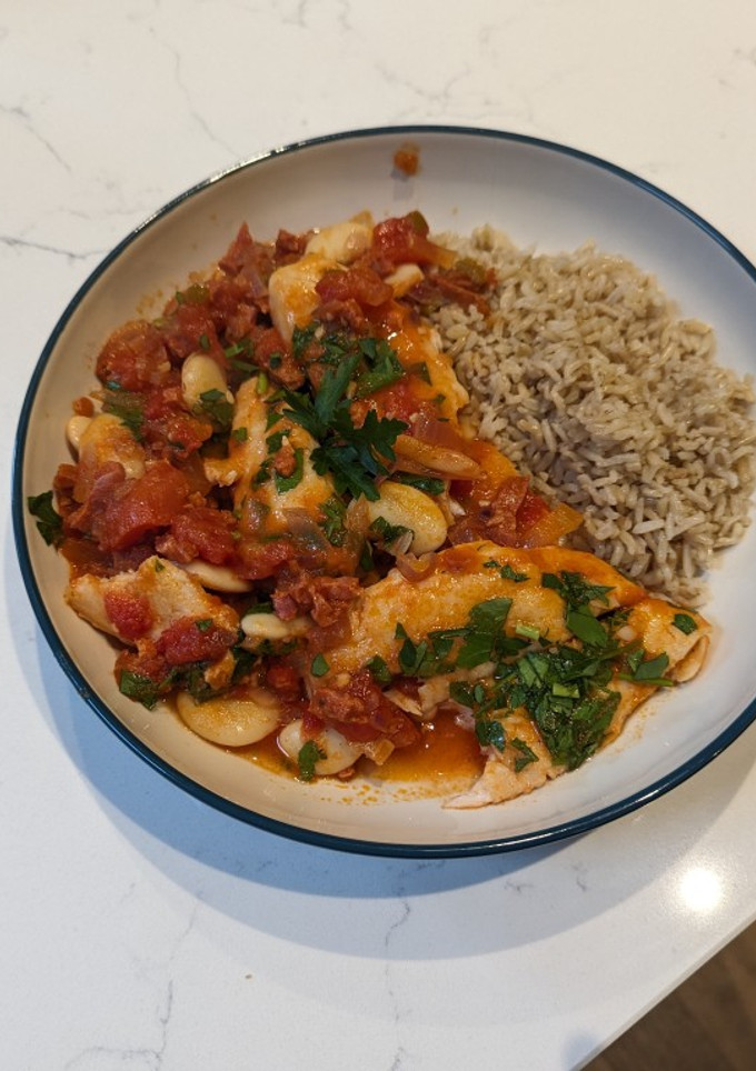 A picture of Cod & chorizo stew with butter beans.