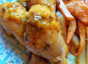 Foto principal de Muslos de pollo en salsa de limón, azafrán y ajos tiernos