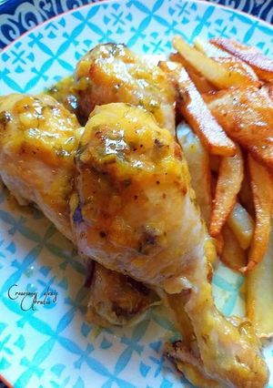 Foto principal de Muslos de pollo en salsa de limón, azafrán y ajos tiernos