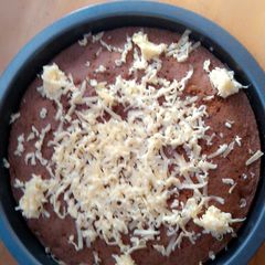 A picture of Mango Cake with Cheese on Top.