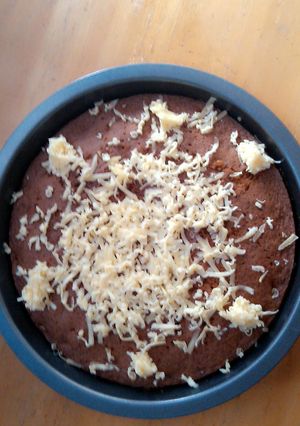 A picture of Mango Cake with Cheese on Top.