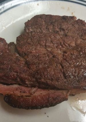 A picture of Fillet Mignon wrapped in Applewood Bacon.