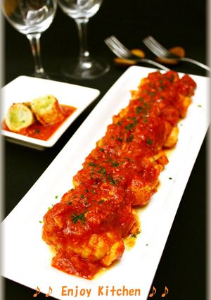 A picture of Meat-Wrapped Cabbage Simmered in Tomato Sauce.