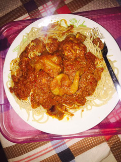 A picture of Cow leg and intestine stew with spaghetti.
