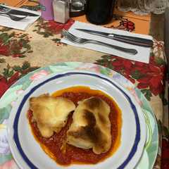 Una foto de Bacalao con tomate y alioli al horno